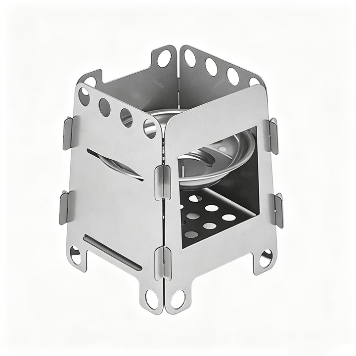 Mini estufa plegable de acero inoxidable con bandeja sobre fondo blanco