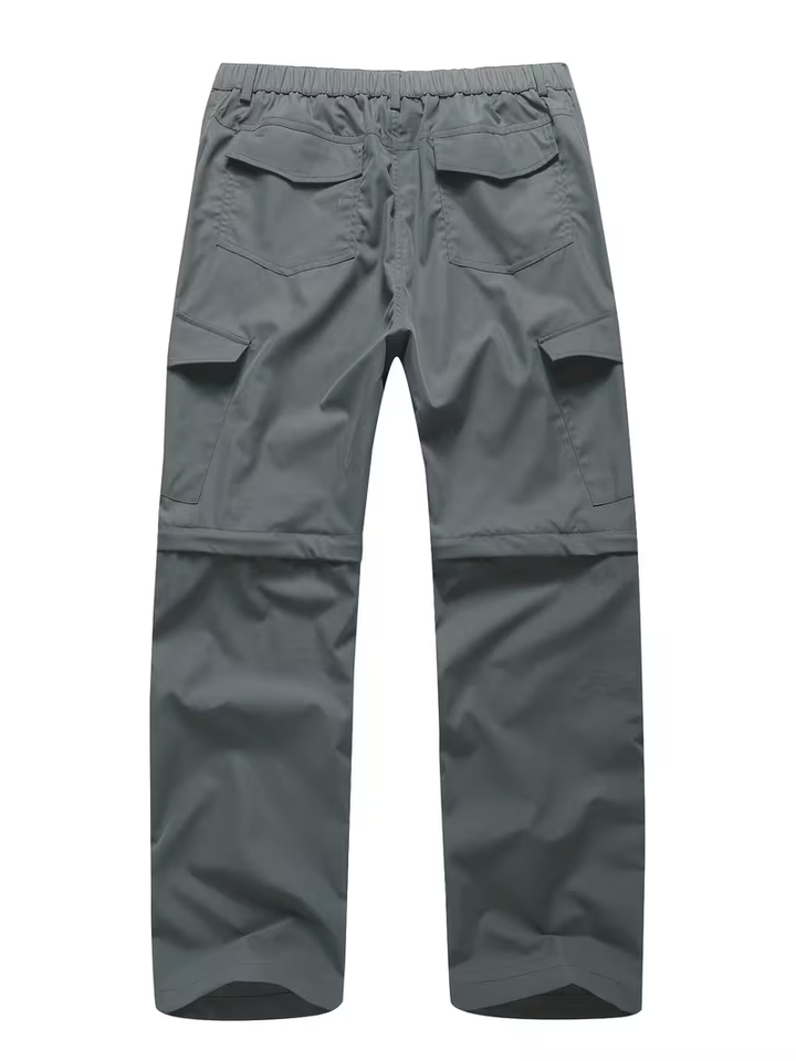 Vista posterior del pantalón de senderismo convertible gris para hombre